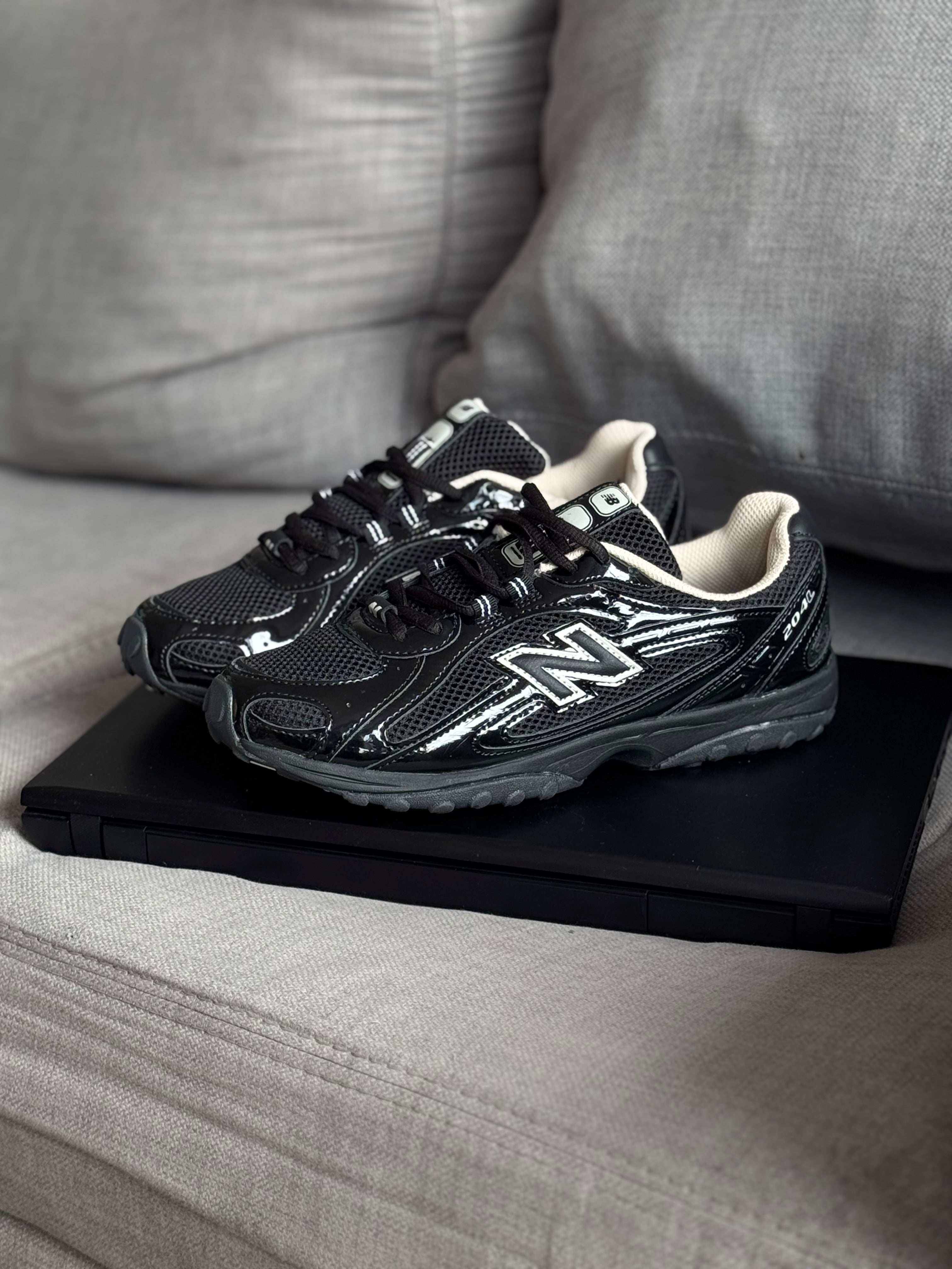 New Balance 204L “ black “