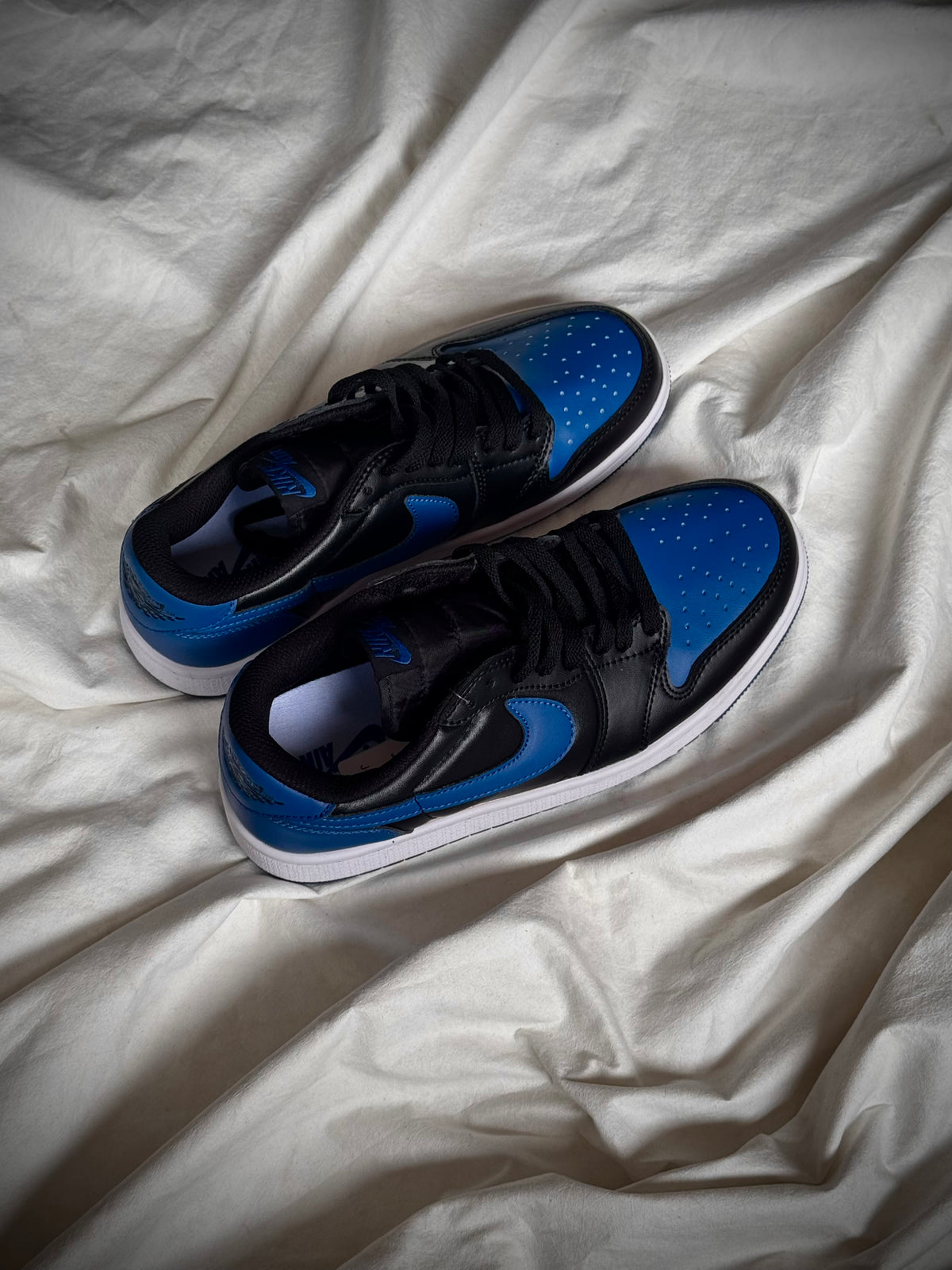 Nike Air Jordan 1 low “Black/ Varsity Royal-Sail”