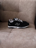 New balance 204L “negro blanco”