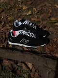 New balance 204L “negro blanco”